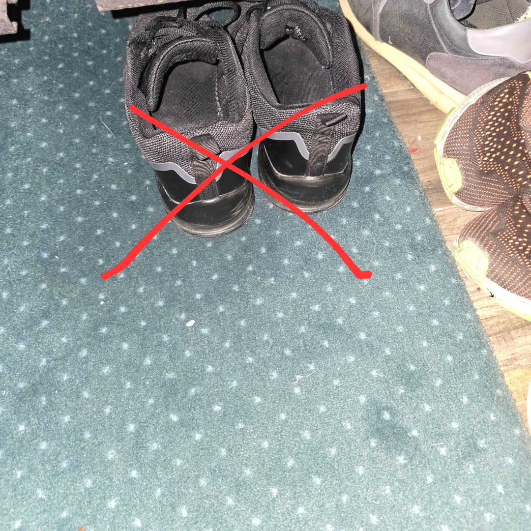 Pas de chaussures  sur le tapis